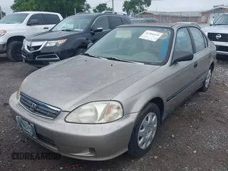 2000 Honda Civic LX z VIN 1HGEJ6675YL037812, wystawiony jako IAAI lot #42504129 z przebiegiem 72 001 mil mil oraz . Historia ofert i sprzedaży dostępna na DreamBid. Obrazek 6.