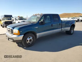 2000 Ford F-350 with VIN 1FTWW32S9YED99031, listed as a Copart auction lot 75952254 with 220,673 mi miles and Salvage title. Bid and sale history available at DreamBid. Image 1.