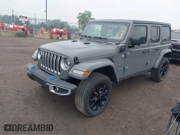 2023 Jeep Wrangler Sahara with VIN 1C4JJXP6XPW698886, listed as a IAAI auction lot 42439690 with 41,787 mi miles and . Bid and sale history available at DreamBid. Image 17.