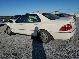 1999 Acura RL with VIN JH4KA9657XC008942, listed as a Copart auction lot 75336774 with 0 mi miles and Salvage Title. Bid and sale history available at carsss.com. Image 2.