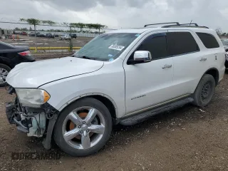 2013 Dodge Durango Citadel with VIN 1C4SDHET2DC613983, listed as a Copart auction lot 80585254 with 164,580 mi miles and Salvage Title. Bid and sale history available at carsss.com. Image 1.