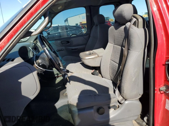 2001 Ford F-150 XL with VIN 1FTZX17211NB16120, listed as a Copart auction lot 54884765 with 124,196 mi miles and Salvage title. Bid and sale history available at DreamBid. Image 7.