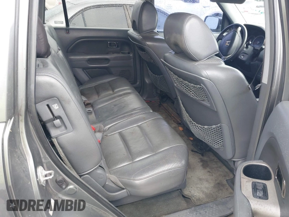 2008 Honda Pilot EX-L with VIN 5FNYF28548B007852, listed as a IAAI auction lot 42387060 with 261,023 mi miles and . Bid and sale history available at DreamBid. Image 8.