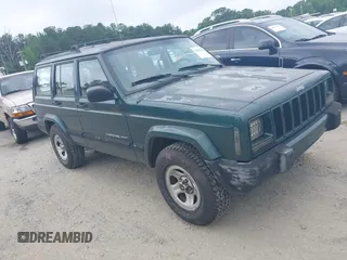 2000 Jeep Cherokee z VIN 1J4FT48S4YL265734, wystawiony jako IAAI lot #42556994 z przebiegiem 228 162 mil mil oraz . Historia ofert i sprzedaży dostępna na DreamBid. Obrazek 1.