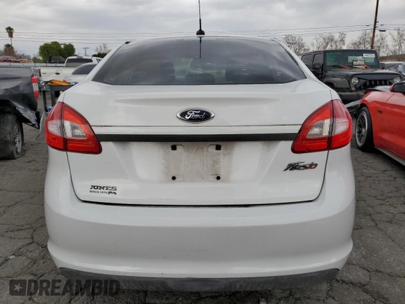 2012 Ford Fiesta S z VIN 3FADP4AJ3CM129398, wystawiony jako Copart lot #44928185 z przebiegiem 175 262 mil mil oraz Czysty tytuł • Clean title. Historia ofert i sprzedaży dostępna na DreamBid. Obrazek 6.