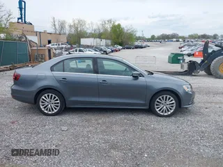 2016 Volkswagen Jetta Sedan 1.8T SEL with VIN 3VWL17AJ0GM213058, listed as a IAAI auction lot 41984066 with 67,014 mi miles. Bid and sale history available at carsss.com. Image 13.