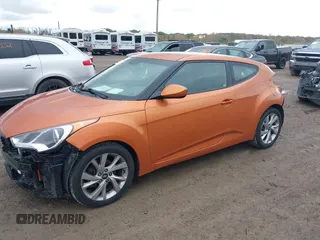 2016 Hyundai Veloster with VIN KMHTC6AD3GU270086, listed as a IAAI auction lot 40602691 with 78,744 mi miles. Bid and sale history available at carsss.com. Image 2.