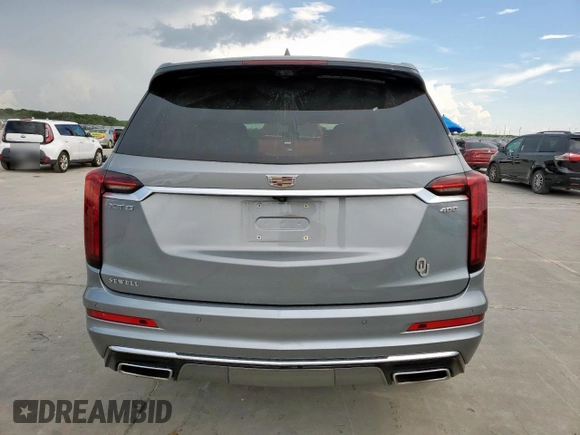 2024 Cadillac XT6 FWD Premium Luxury with VIN 1GYKPCRS7RZ704046, listed as a Copart auction lot 62534055 with 25,644 mi miles and Salvage title. Bid and sale history available at DreamBid. Image 6.