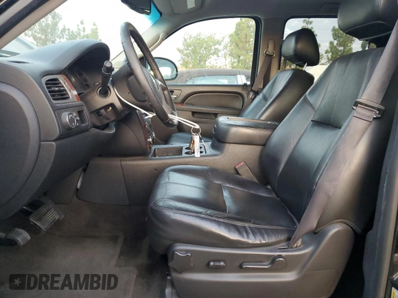 2014 Chevrolet Suburban LT with VIN 1GNSCJE00ER223194, listed as a Copart auction lot 70309624 with 150,009 mi miles and Salvage Title. Bid and sale history available at carsss.com. Image 7.