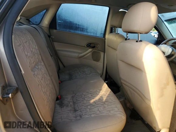 2005 Ford Focus S with VIN 1FAFP34N65W240449, listed as a Copart auction lot 52457395 with 140,246 mi miles and Non Repairable. Bid and sale history available at DreamBid. Image 10.