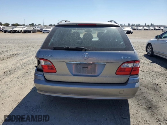 2005 Mercedes-Benz E 500 with VIN WDBUH83J35X168838, listed as a Copart auction lot 69885014 with 203,187 mi miles and Salvage Title. Bid and sale history available at carsss.com. Image 6.