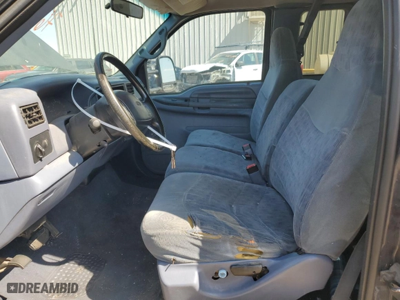 1999 Ford Super Duty F-250 XL with VIN 1FTNX20S9XED77115, listed as a Copart auction lot 76047764 with 390,275 mi miles and Salvage Title. Bid and sale history available at carsss.com. Image 7.