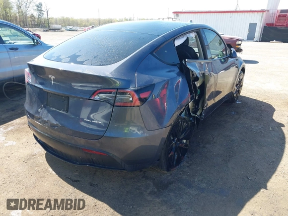 2022 Tesla Model Y Long Range z VIN 7SAYGAEE9NF574634, wystawiony jako IAAI lot #42040719 z przebiegiem 29 675 mil mil oraz . Historia ofert i sprzedaży dostępna na DreamBid. Obrazek 6.