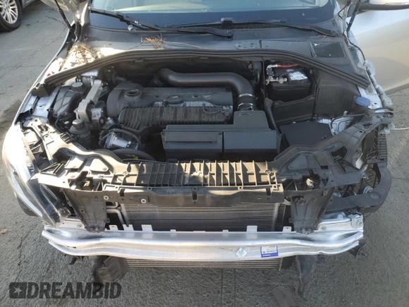 2015 Volvo V60 z VIN YV1612SB6F1211119, wystawiony jako Copart lot #77466004 z przebiegiem 144 388 mil mil oraz Szkoda całkowita • Salvage title. Historia ofert i sprzedaży dostępna na DreamBid. Obrazek 11.