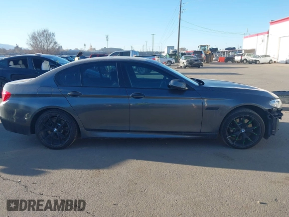 2015 BMW 5 Series 535i xDrive with VIN WBA5B3C58FD547704, listed as a IAAI auction lot 41764129 with 152,649 mi miles. Bid and sale history available at carsss.com. Image 14.