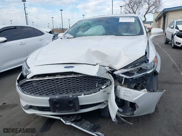 2019 Ford Fusion Hybrid Titanium with VIN 3FA6P0RU2KR104817, listed as a IAAI auction lot 41695813 with NaN miles. Bid and sale history available at carsss.com. Image 12.