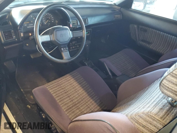 1986 Toyota Celica z VIN JT2ST64CXG7013064, wystawiony jako Copart lot #44228575 z przebiegiem 101 881 mil mil oraz Szkoda całkowita • Salvage title. Historia ofert i sprzedaży dostępna na DreamBid. Obrazek 8.