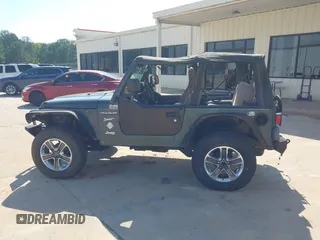 2002 Jeep Wrangler Sport with VIN 1J4FA49S52P760173, listed as a IAAI auction lot 42468550 with 201,682 mi miles and . Bid and sale history available at DreamBid. Image 14.