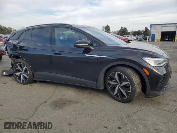 2023 Volkswagen ID.4 Pro with VIN 1V2VMPE80PC028390, listed as a Copart auction lot 48566185 with 74,329 mi miles and Salvage Title. Bid and sale history available at DreamBid. Image 4.