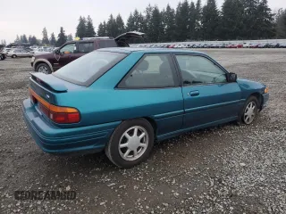 1995 Ford Escort z VIN 1FASP1284SW307142, wystawiony jako Copart lot #88531955 z przebiegiem 93 323 mil mil oraz Szkoda całkowita • Salvage title. Historia ofert i sprzedaży dostępna na DreamBid. Obrazek 3.