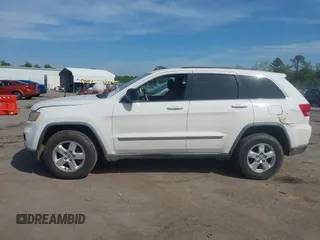 2012 Jeep Grand Cherokee Laredo with VIN 1C4RJFAG2CC176313, listed as a IAAI auction lot 42098127 with 162,556 mi miles. Bid and sale history available at carsss.com. Image 14.