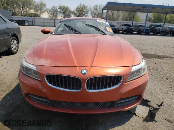 2014 BMW Z4 sDrive28i with VIN WBALL5C50EJ105435, listed as a Copart auction lot 63143824 with 0 mi miles and Salvage Title. Bid and sale history available at carsss.com. Image 5.