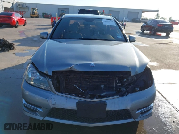2014 Mercedes-Benz C 250 Sport with VIN WDDGF4HB0EG238946, listed as a IAAI auction lot 41973753 with 116,694 mi miles and . Bid and sale history available at DreamBid. Image 13.