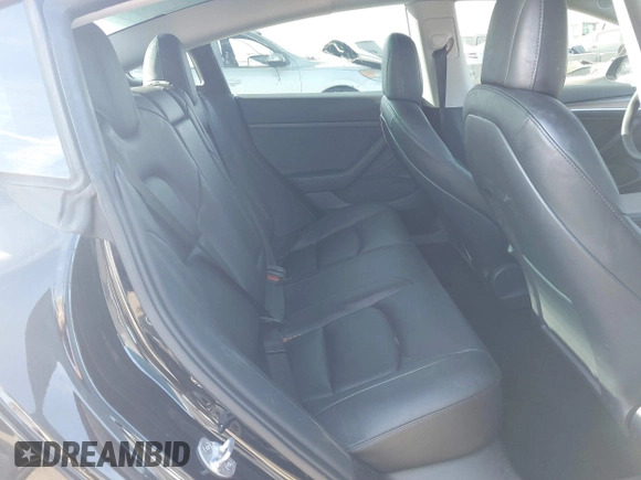 2022 Tesla Model 3 Long Range with VIN 5YJ3E1EB1NF313954, listed as a IAAI auction lot 41248187 with 31,247 mi miles and . Bid and sale history available at DreamBid. Image 8.