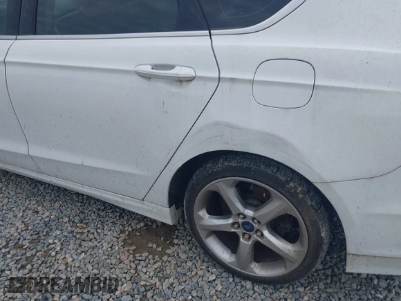 2015 Ford Fusion SE z VIN 3FA6P0H98FR239349, wystawiony jako IAAI lot #42224096 z przebiegiem 244 653 mil mil oraz . Historia ofert i sprzedaży dostępna na DreamBid. Obrazek 6.