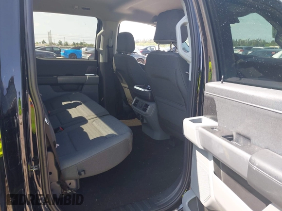 2024 Ford F-150 Lightning XLT with VIN 1FTVW3LK8RWG20320, listed as a IAAI auction lot 41960103 with Not provided miles and . Bid and sale history available at DreamBid. Image 8.