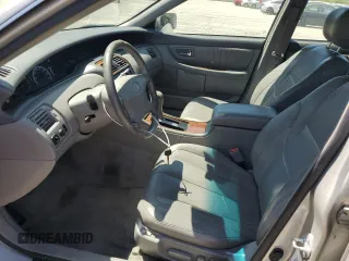 2001 Toyota Avalon XL z VIN 4T1BF28B11U154831, wystawiony jako Copart lot #57131435 z przebiegiem 211 745 mil mil oraz Szkody całkowita. Historia ofert i sprzedaży dostępna na DreamBid. Obrazek 7.