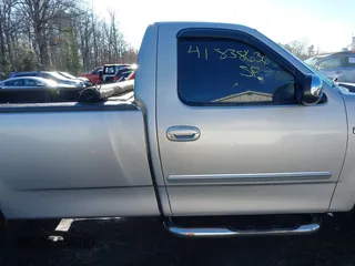 2002 Ford F-150 XL with VIN 1FTRF17242NA48027, listed as a IAAI auction lot 41838636 with 69,821 mi miles. Bid and sale history available at carsss.com. Image 13.