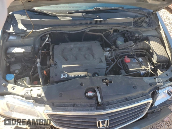 1999 Honda Odyssey EX with VIN 2HKRL1860XH541737, listed as a Copart auction lot 88897965 with 112,164 mi miles and Salvage title. Bid and sale history available at DreamBid. Image 14.