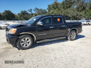 2013 Nissan Titan SV with VIN 1N6BA0ED0DN310074, listed as a Copart auction lot 80883894 with 176,946 mi miles and Salvage title. Bid and sale history available at DreamBid. Image 1.