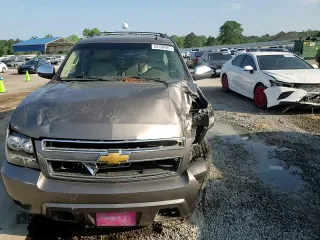 2011 Chevrolet Tahoe LS with VIN 1GNSCAE00BR395849, listed as a Copart auction lot 54750685 with 183,336 mi miles and Salvage title. Bid and sale history available at DreamBid. Image 14.
