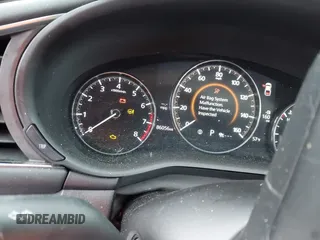 2021 Mazda 3 Preferred z VIN 3MZBPBCL0MM250862, wystawiony jako IAAI lot #42318612 z przebiegiem 86 056 mil mil oraz . Historia ofert i sprzedaży dostępna na DreamBid. Obrazek 7.