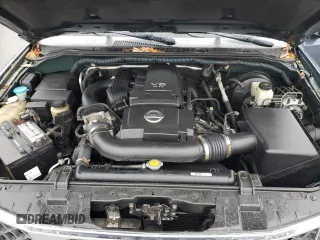 2005 Nissan Pathfinder SE z VIN 5N1AR18W65C705332, wystawiony jako Copart lot #86779704 z przebiegiem 119 877 mil mil oraz Czysty tytuł • Clean title. Historia ofert i sprzedaży dostępna na DreamBid. Obrazek 12.