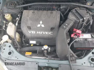 2007 Mitsubishi Outlander XLS z VIN JA4MS41X57Z016273, wystawiony jako IAAI lot #38897236 z przebiegiem 165 376 mil mil oraz . Historia ofert i sprzedaży dostępna na DreamBid. Obrazek 10.