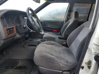 1997 Jeep Grand Cherokee TSi with VIN 1J4FX58S2VC612449, listed as a Copart auction lot 43532675 with 221,382 mi miles and Salvage Title. Bid and sale history available at carsss.com. Image 7.