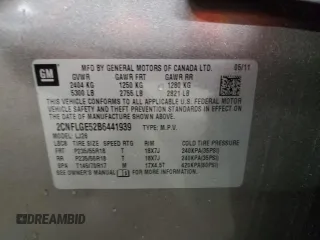 2011 Chevrolet Equinox LTZ z VIN 2CNFLGE52B6441939, wystawiony jako Copart lot #56030665 z przebiegiem 101 638 mil mil oraz Szkoda całkowita • Salvage title. Historia ofert i sprzedaży dostępna na DreamBid. Obrazek 13.