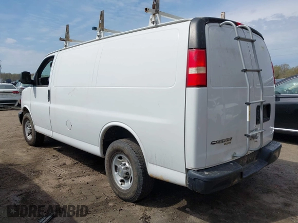 2014 Chevrolet Express Cargo Van with VIN 1GCWGFCA7E1110011, listed as a IAAI auction lot 41983301 with 114,827 mi miles. Bid and sale history available at carsss.com. Image 3.