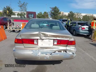 2000 Toyota Camry LE z VIN JT2BF22K5Y0258522, wystawiony jako IAAI lot #41998874 z przebiegiem 300 186 mil mil oraz . Historia ofert i sprzedaży dostępna na DreamBid. Obrazek 16.