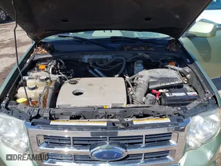 2009 Ford Escape Hybrid with VIN 1FMCU493X9KA56174, listed as a IAAI auction lot 39435925 with 158,171 mi miles. Bid and sale history available at carsss.com. Image 10.