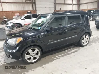 2011 Kia Soul + with VIN KNDJT2A2XB7196479, listed as a IAAI auction lot 41747551 with 205,849 mi miles. Bid and sale history available at carsss.com. Image 2.