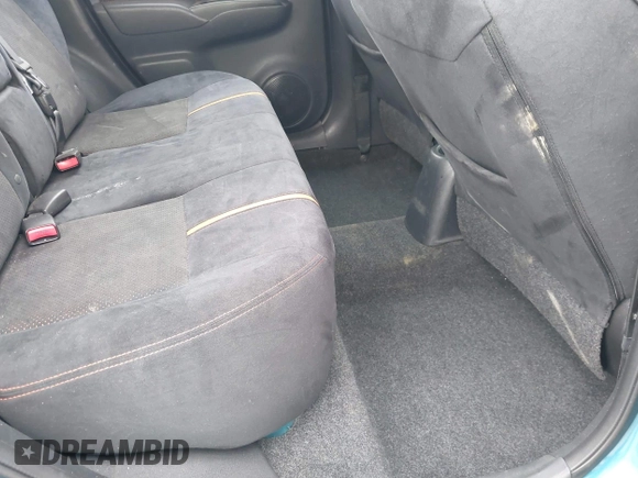 2015 Nissan Note SV with VIN 3N1CE2CP0FL396030, listed as a IAAI auction lot 42030132 with 46,635 mi miles and . Bid and sale history available at DreamBid. Image 8.