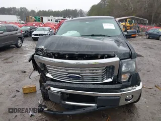 2011 Ford F-150 XLT with VIN 1FTFW1CT5BFB13799, listed as a IAAI auction lot 41426609 with 200,000 mi miles. Bid and sale history available at carsss.com. Image 11.