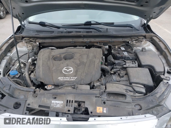 2014 Mazda 3 i Touring with VIN JM1BM1L76E1204265, listed as a IAAI auction lot 42565471 with 68,675 mi miles and . Bid and sale history available at DreamBid. Image 10.