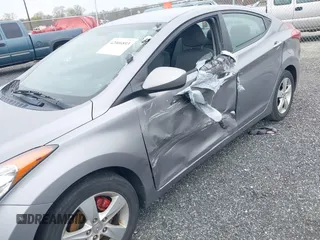 2012 Hyundai Elantra Limited with VIN KMHDH4AE2CU433033, listed as a IAAI auction lot 42006893 with 124,892 mi miles. Bid and sale history available at carsss.com. Image 6.