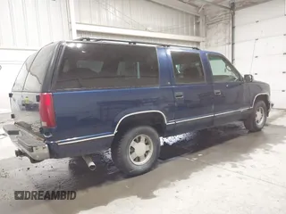 1999 Chevrolet Suburban with VIN 3GNEC16RXXG237570, listed as a IAAI auction lot 40210234 with 176,902 mi miles. Bid and sale history available at carsss.com. Image 4.