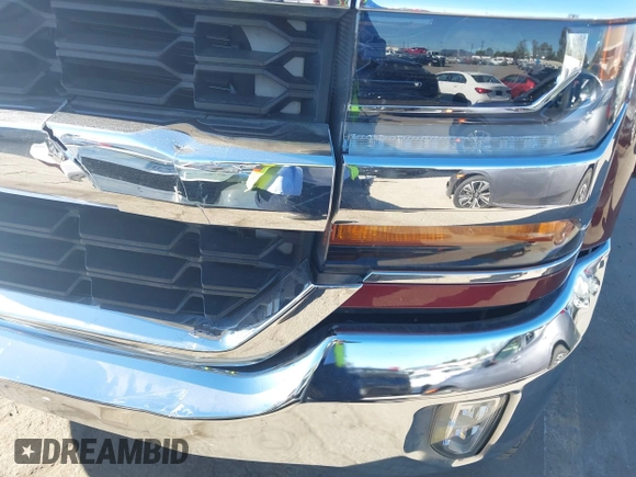 2017 Chevrolet Silverado 1500 LT with VIN 1GCRCREC0HZ171084, listed as a IAAI auction lot 40142848 with 137,420 mi miles and . Bid and sale history available at DreamBid. Image 6.
